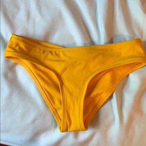 Yellow swim suit bottoms XS